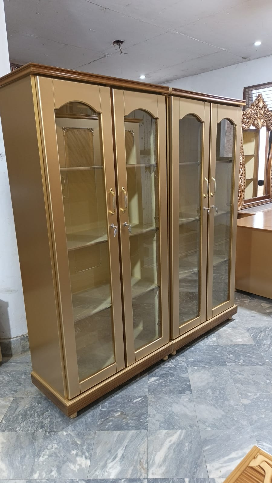 Honey-Tone Four-Door Display Cabinet — main view from the supplied Priceless collection
