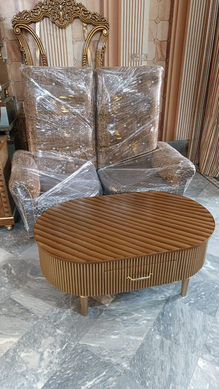 Warm Brown Fluted Oval Coffee Table — main view from the supplied Priceless collection