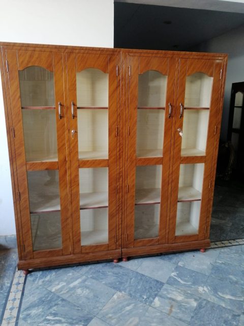 Amber Four-Door Display Cabinet — main view from the supplied Priceless collection