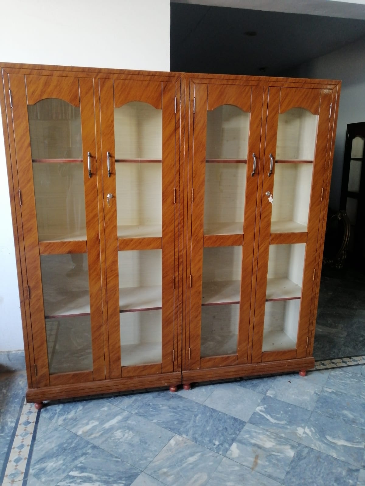 Amber Four-Door Display Cabinet — main view from the supplied Priceless collection
