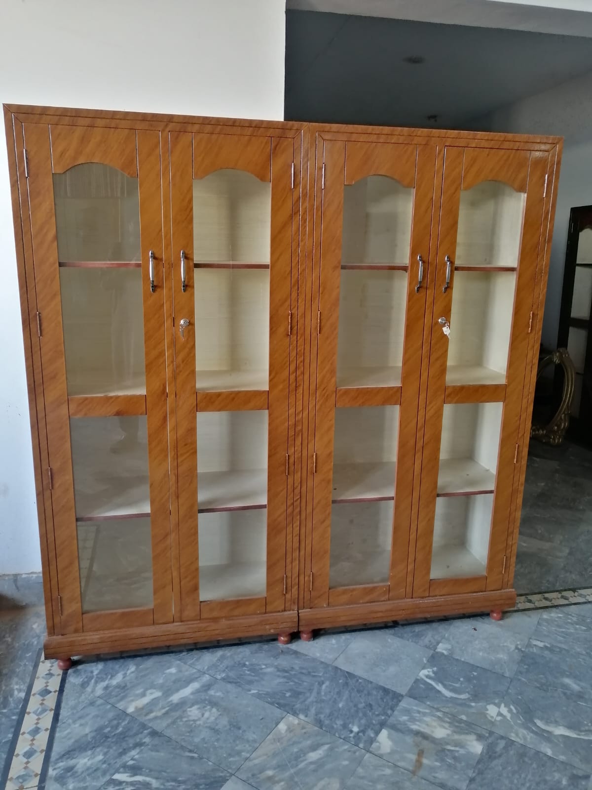 Amber Four-Door Display Cabinet — additional view from the supplied Priceless collection